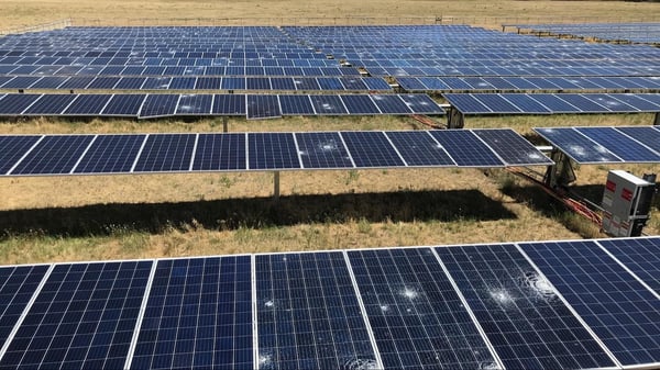 Utility-scale solar array with hail damage